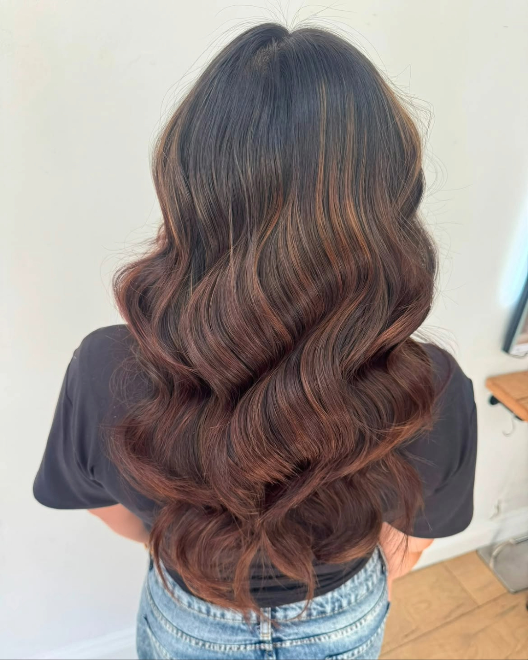 after picture of a brunette balayage with red highlights carried out at affinity hair salon in taunton
